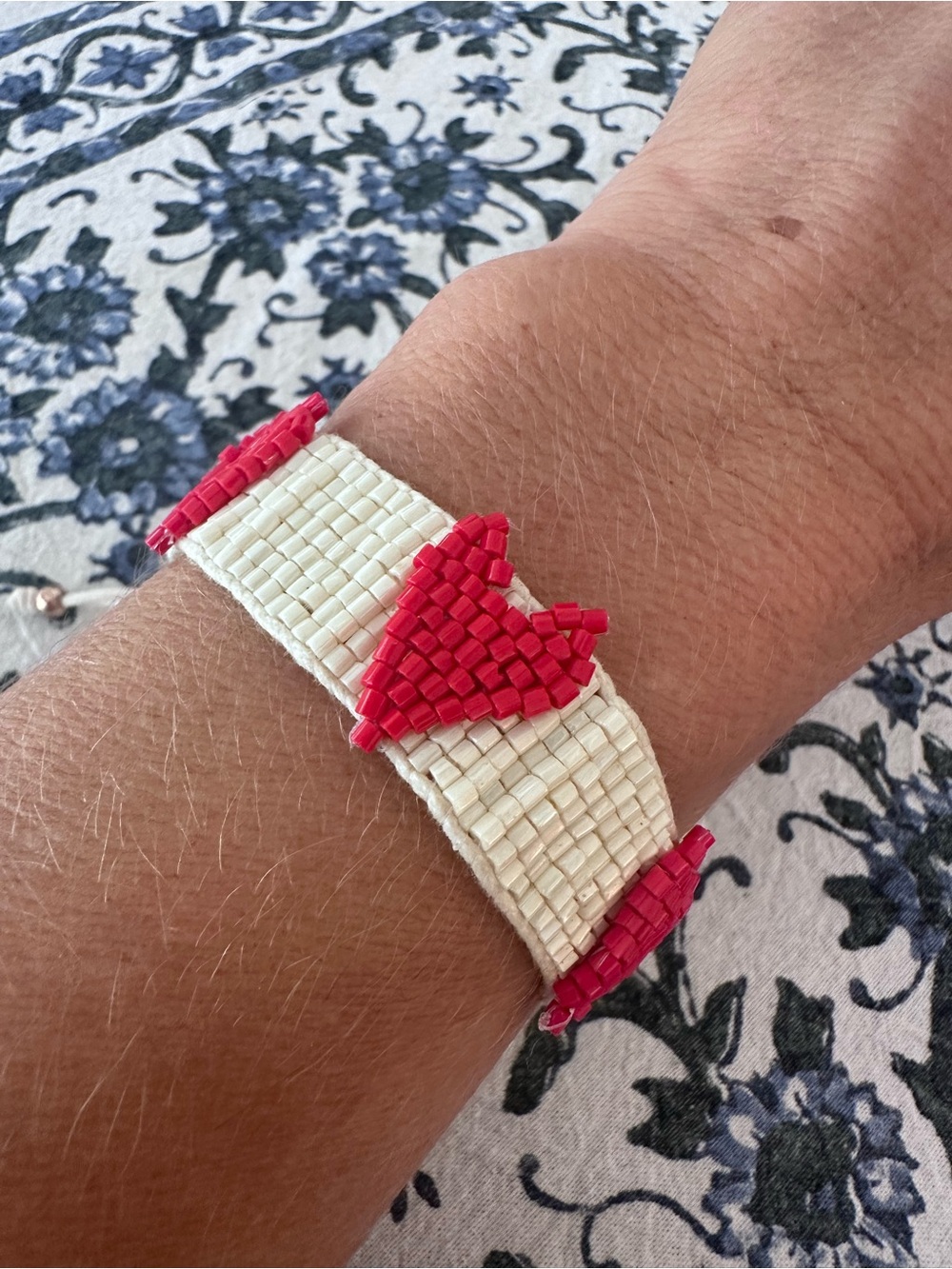 Handcrafted Red & White Beaded Bracelet with Red Heart Accents